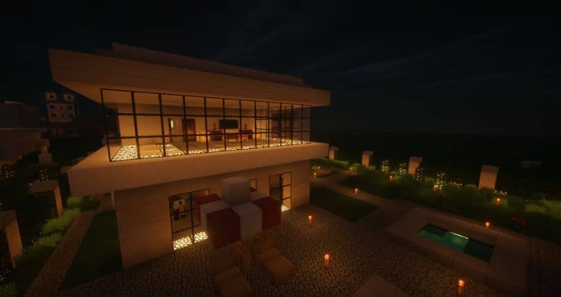 casa de minecraft de noche con luces